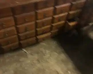 storage cabinet with many small drawers