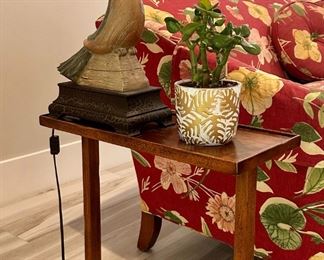 The side table and plant are sold.