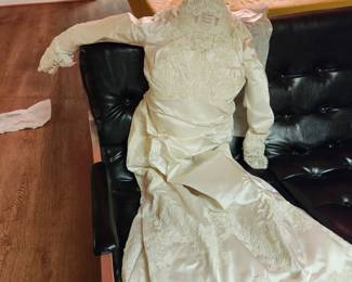 2 vintage wedding gowns, both were stored in sealed wedding gown boxes