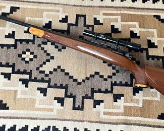Custom Bolt Action Rifle with Scope 	Total Length: 44.35in Long	
