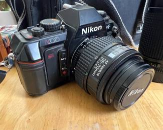 Nikon N2020 35mm Camera w/ 35-70mm & AF Nikkor 70-210mm Lens		
