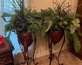 bullet style botanical arrangements in stands