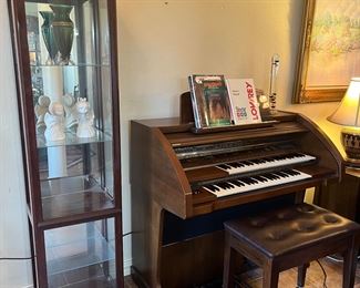 curio cabinet and organ