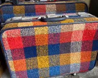 vintage multi-colored, soft-shell suitcases
