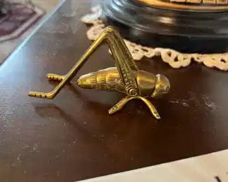 brass grasshopper