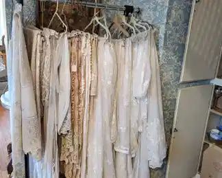 Antique lace tablecloths and vintage lace curtains.