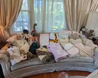 Vintage dolls, vintage quilts, antique lace pillows.