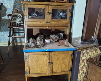 Child's leaded glass Sellers Hoosier cabinet with porcelain top.