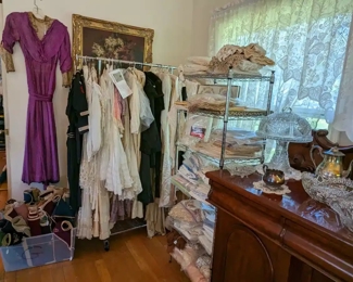 Victorian and vintage clothing, needlepoints, and linens.