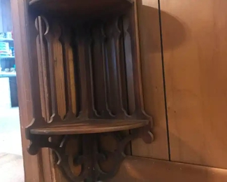 beautiful small corner shelf. Not currently hung.
