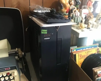 Acer computer, about two years old. Powered by an Intel i5 processor, its video output is via HDMI. It has been rest to factory settings. Also, nice portable typewriter with case. 