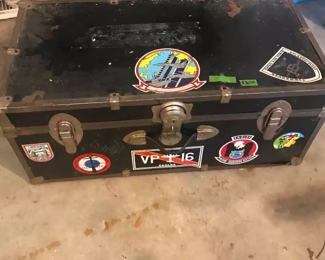 Old foot locker that has seen some travel and has the stickers to show it! Can stand a bit of spiffing up, but includes the key to the center lock, which works!