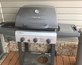 Char-Broil gas grill, 3 burner plus side burner. You can brew coffee while you're cooking!