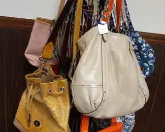 Purses including Dooney and Bourke, Vera Bradley,  Coach,  more