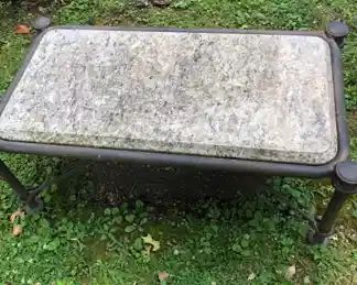 Wrought iron marble bench