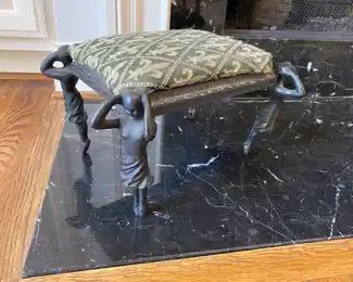 Small metal foot stool