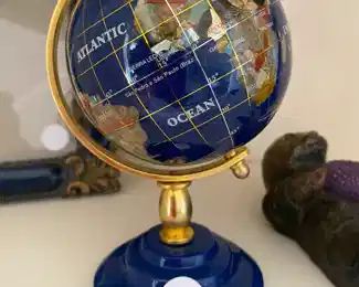 Small stone and brass globe