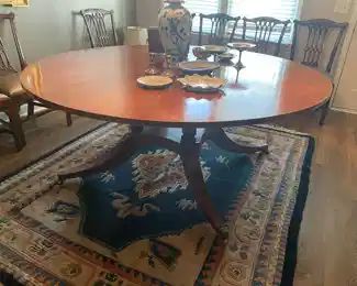 Beautiful round dining table with bird cage pedestal base. 6 feet in diameter