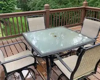 Out door tables with 4 chairs(swivel rockers)