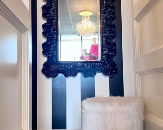 Black mirrors and cube ottoman 
