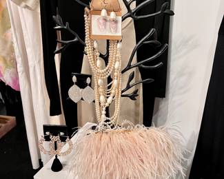 Feather handbag, jewelry and pedestal