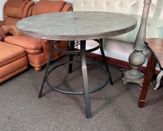 Metal bistro patio table, sturdy tubular metal frame and metal top with umbrella opening 35"H x 48"W