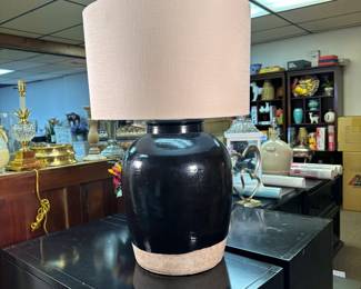 Grand table lamp with barrel shade and black, glazed pottery base 30"H x 20"W