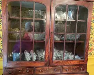 Estate of Jon & Emma Cram, Marietta, Ohio.  Period mahogany cabinet with center pull drawer, original glass, slight in size.  This piece would be beautiful in living area, bedroom and dinning ares.  Perfect size.