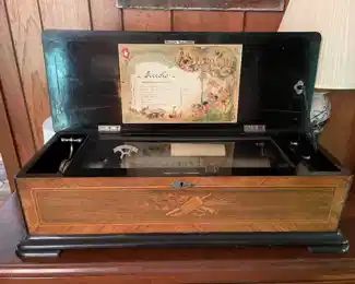 From Marietta, Ohio estate of Jon and Emma Cram (oil & gas rights).  Jacot’s music box.  8 Airs.  Purchased in London.  Excellent casing and excellent working condition, comes with original instructions and care.