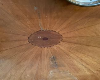 Early antique oval low table with marquetry bellflowers inlay