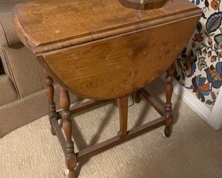 Birdseye maple drop leaf table. Estate of John & Emma Crum 