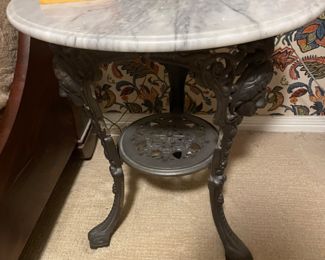 Cast iron, marble top table.  Estate of John & Emma Crum 