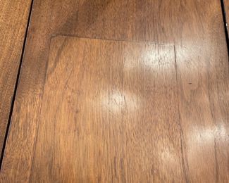 This table is soooo charming that my clients used it for their formal dinning  table with 8 antique Chippendale formal chairs.  An antique 19th century solid walnut oval drop leaf extension table with 45 legs and 4 leaves. Solid walnut five turned legs. Four solid walnut original leaves. Table is in a clean original finish. Original casters. Original custom primitive drop leaf brackets. All original parts and in good working order.  This table has a super charming primitive patch on the main table surface.   Photo of patch