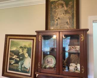 Small antique wall display cabinet filled with child china