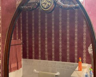 Ornate oval mirror