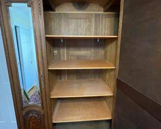 Beautifully carved armoire with carving and custom shelves