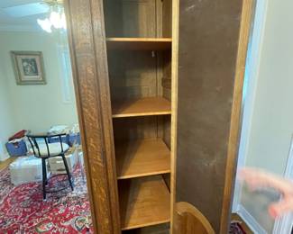 Beautifully carved armoire with carving and custom shelves