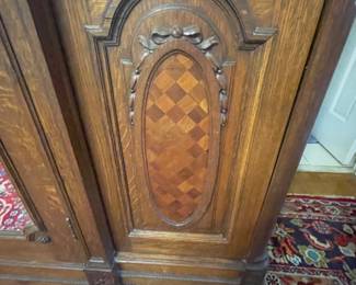 Beautifully carved armoire with carving and custom shelves
