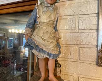 Pair of plaster boy and girl