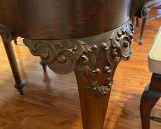 Beautiful carved antique dinning table with 6 legs (2 center legs) with 4 leaves, custom table pad.