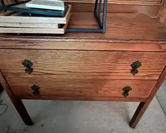 Antique two-drawer chest with those beautiful drop knob pulls.  Look at the grain detail.  Yummm.