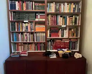 This bookcase....WOW!  All of the books and this bookcase are for sale.  Some Dickens series books, Fiction/Non-Fiction, and many, many art books available.