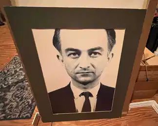 Photography -- just one photo out of the many, many tubs of photographs that this gentleman has snapped through the years.