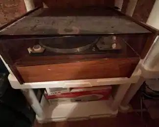 This is a lovely record player with a fabulous MCM wood base.  Will have more info on it as setup commences.