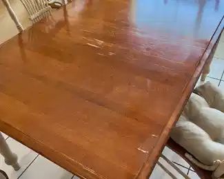 NOW $150 was $350 	Kitchen table made in Canada 38Wx5Lx30H & 4 chairs 18Wx16Dx42H - As is top 