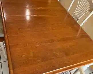 NOW $150 was  $350 	Kitchen table made in Canada 38Wx5Lx30H & 4 chairs 18Wx16Dx42H - As is top 