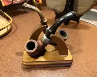 $42 	
2 pipes on stands 	