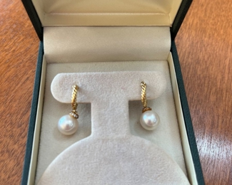 $300 pair of 14kt gold hoop post style drop earrings pearls with tiny diamonds crowning the pearl. 
