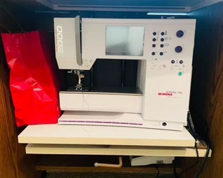 $350 	
#5 Bernina Artista 180 sewing & embroidery machine withtable & chair 