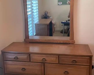 $175 	
#6 Wood dresser 7 drawers 54X18X31 & mirror 